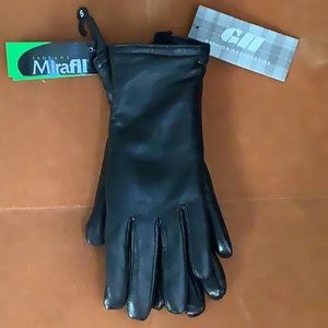 Genuine leather black ladies gloves.  Size small  New
